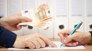 employer or businessman showing where to sign  in exchange